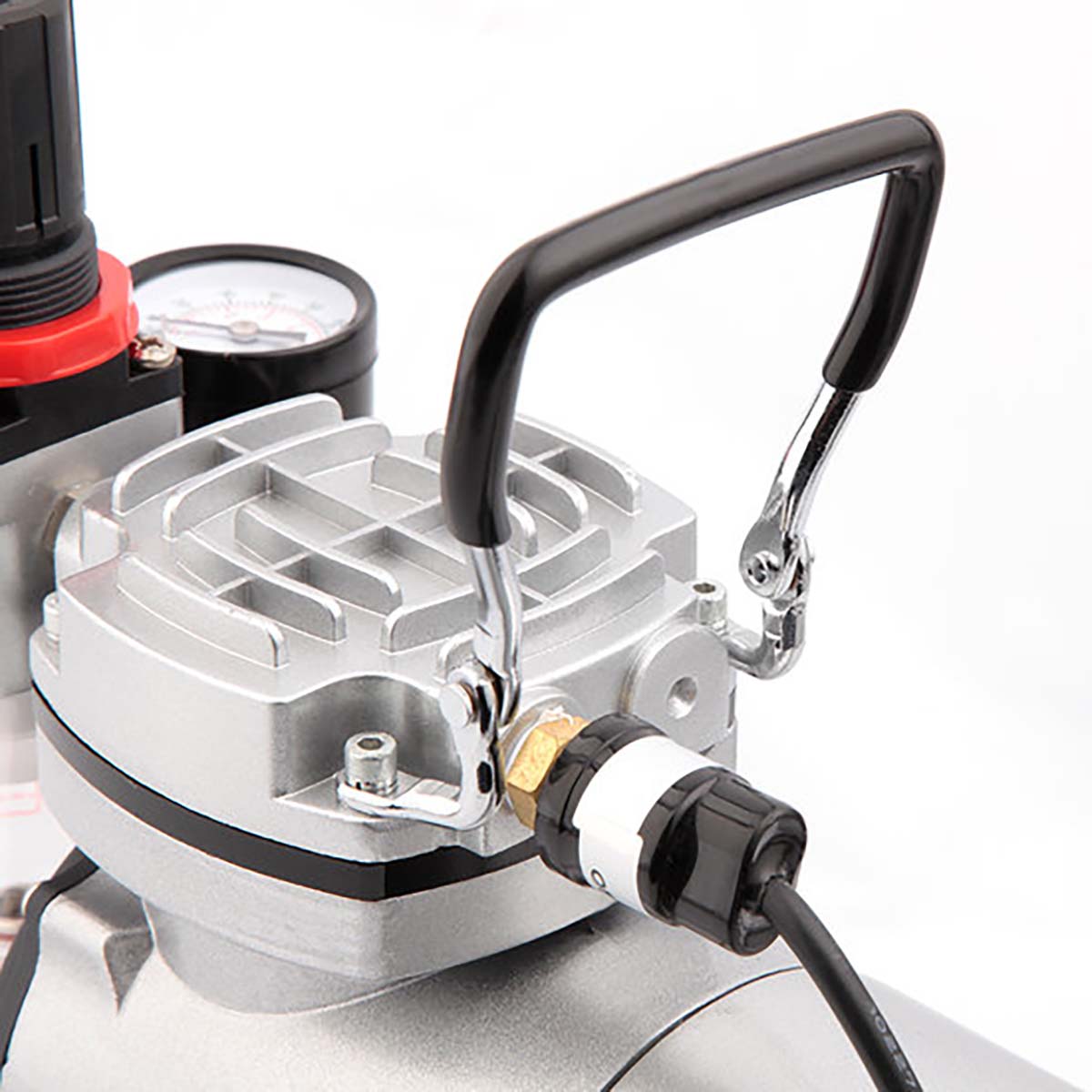 Mini compresseur Autres pour aérographe avec piston, idéal pour teintures et peintures, image montrant le compresseur compact.