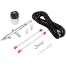 Kit aérographe Fengda FE-182K double action avec 3 aiguilles pour peinture et teintures, image montrant l’outil et ses aiguilles.