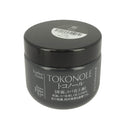 Gomme de finition Tokonole pour cuir noir, 120g, utilisée pour finaliser et protéger les surfaces en cuir.