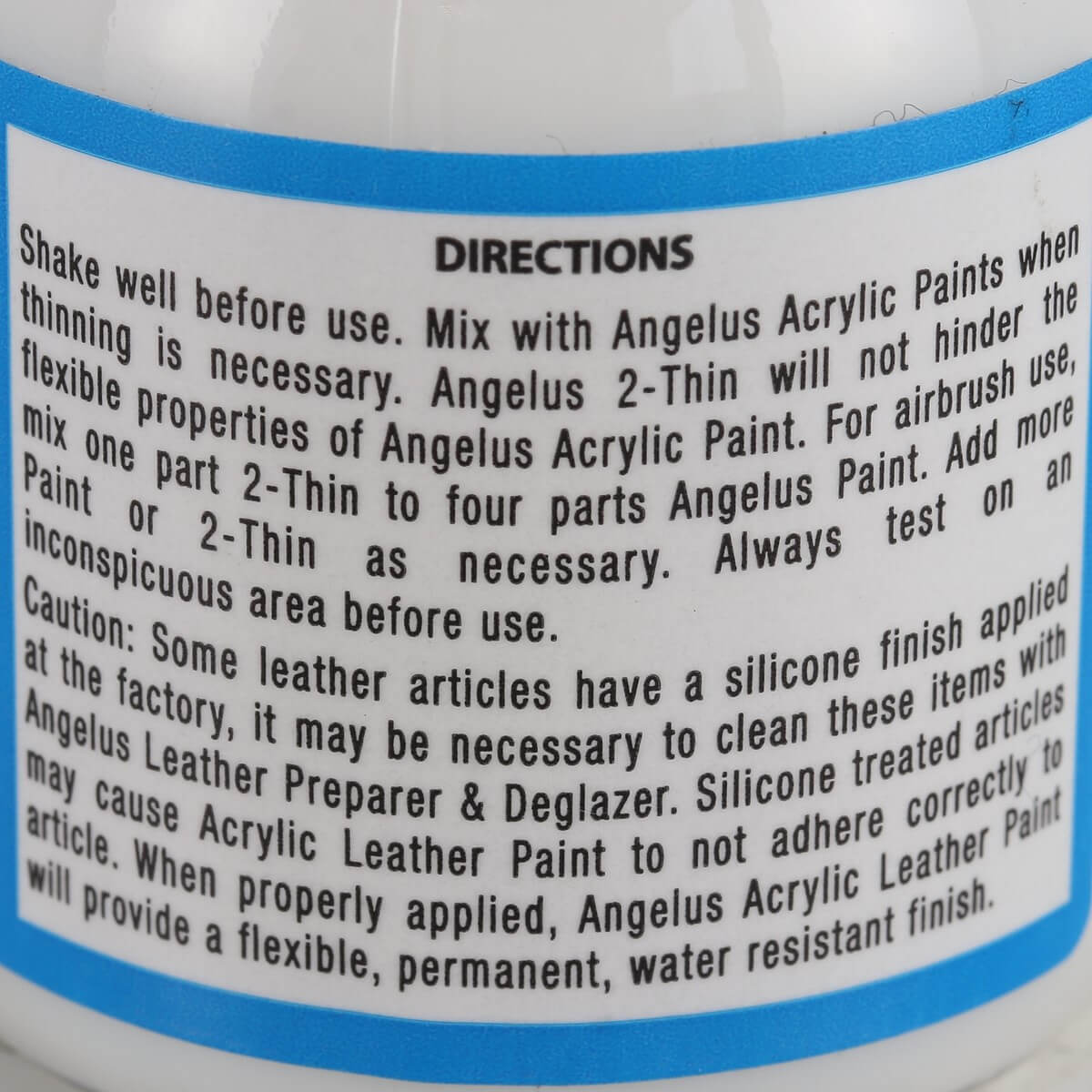 Diluant 2-Thin pour peinture Angelus, liquide clair pour teintes et peintures artistiques, dans un flacon transparent.
