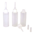 Trois petits bidons en plastique de 30 ml de colle pour cuir, pratiques et légers, destinés à réparer ou assembler des articles en cuir.