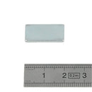 Aimant rectangulaire Autres, accessoires magnétiques de 20x10x2 cm, placé sur une surface métallique.