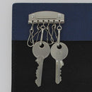 Attache porte-clés avec 6 mousquetons en bouclerie, idéale pour organiser et sécuriser vos clés.