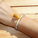 Lacet en cuir rond jaune de 2 mm de diamètre, 1 mètre, pour bracelet ou accessoires, de la marque Deco Cuir.
