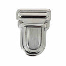 Fermeture de cartable TUCK en nickel, accessoire pour sac ou cartable, dimensions 28x36mm, finition résistante et durable.