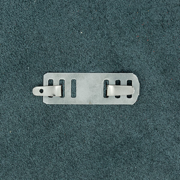 Fermoir pour sac rectangle Autres, 25x36mm, vue arrière, accessoire en métal pour fermeture de sac.