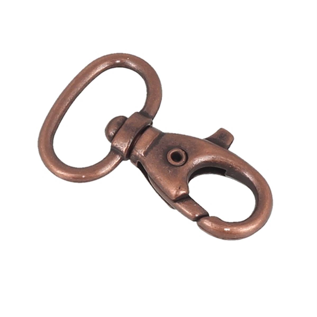 Mousqueton tournant en vieux cuivre de 20 mm, bouclerie résistante pour la fixation et la sécurisation.