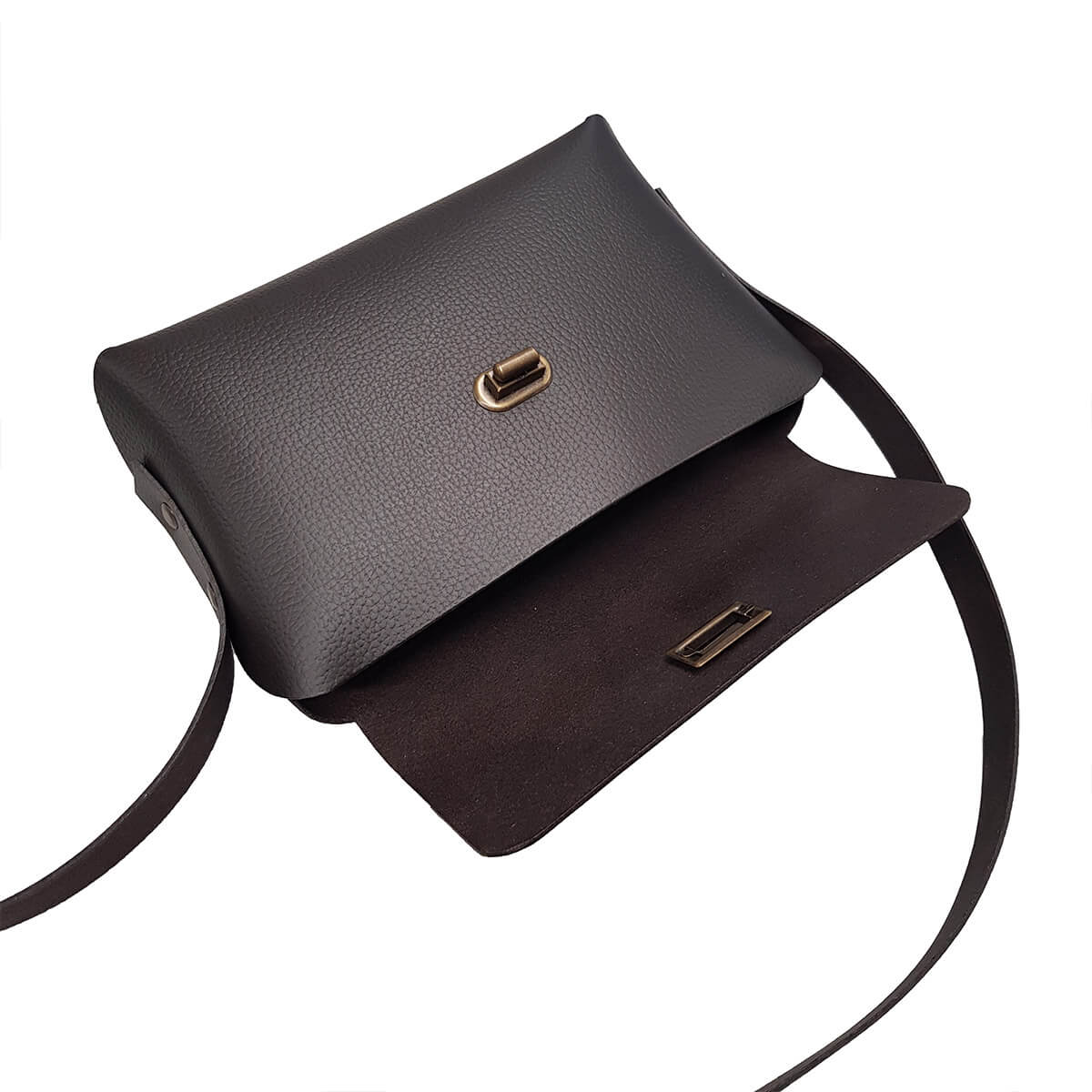 Kit DIY pour créer une pochette en cuir tannage végétal marron foncé, par Deco Cuir, avec matériau et outils inclus.